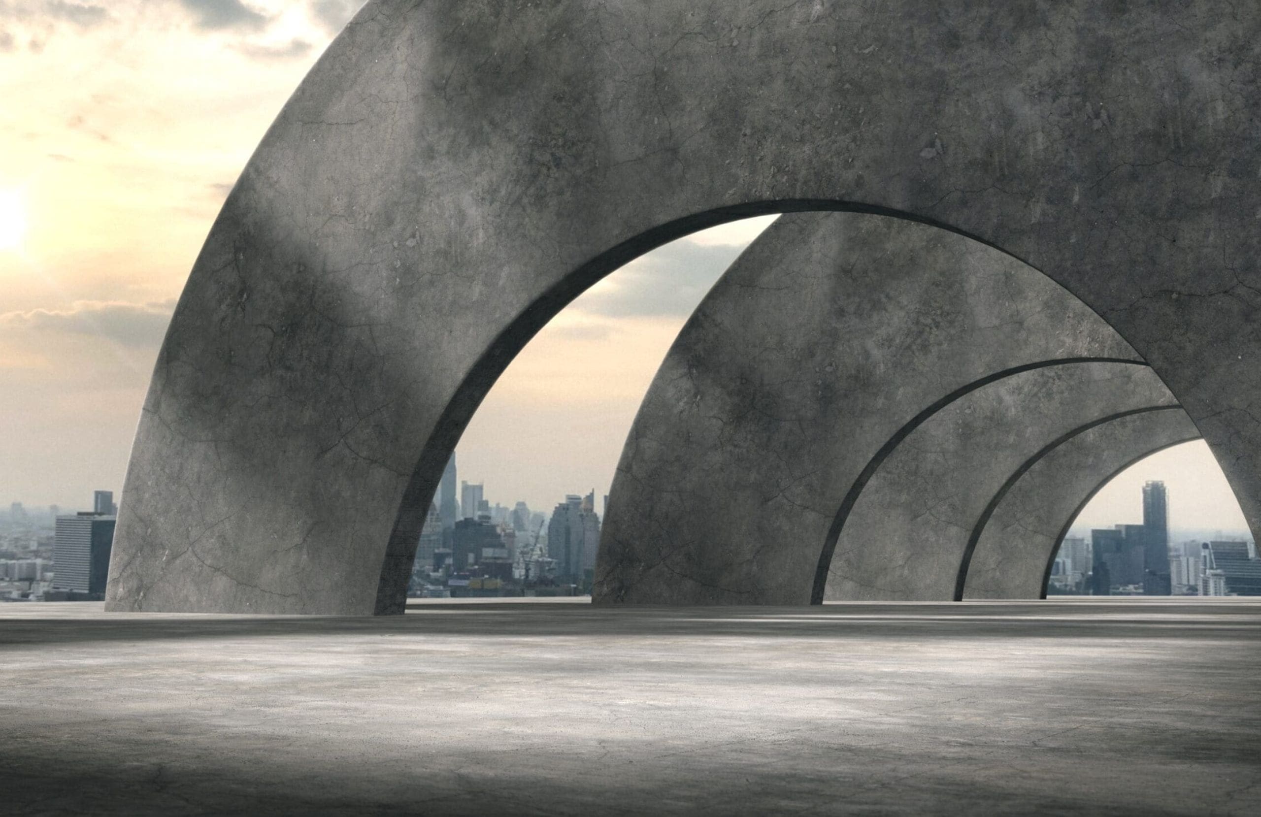 Large concrete arches covering a open-plan social walking area